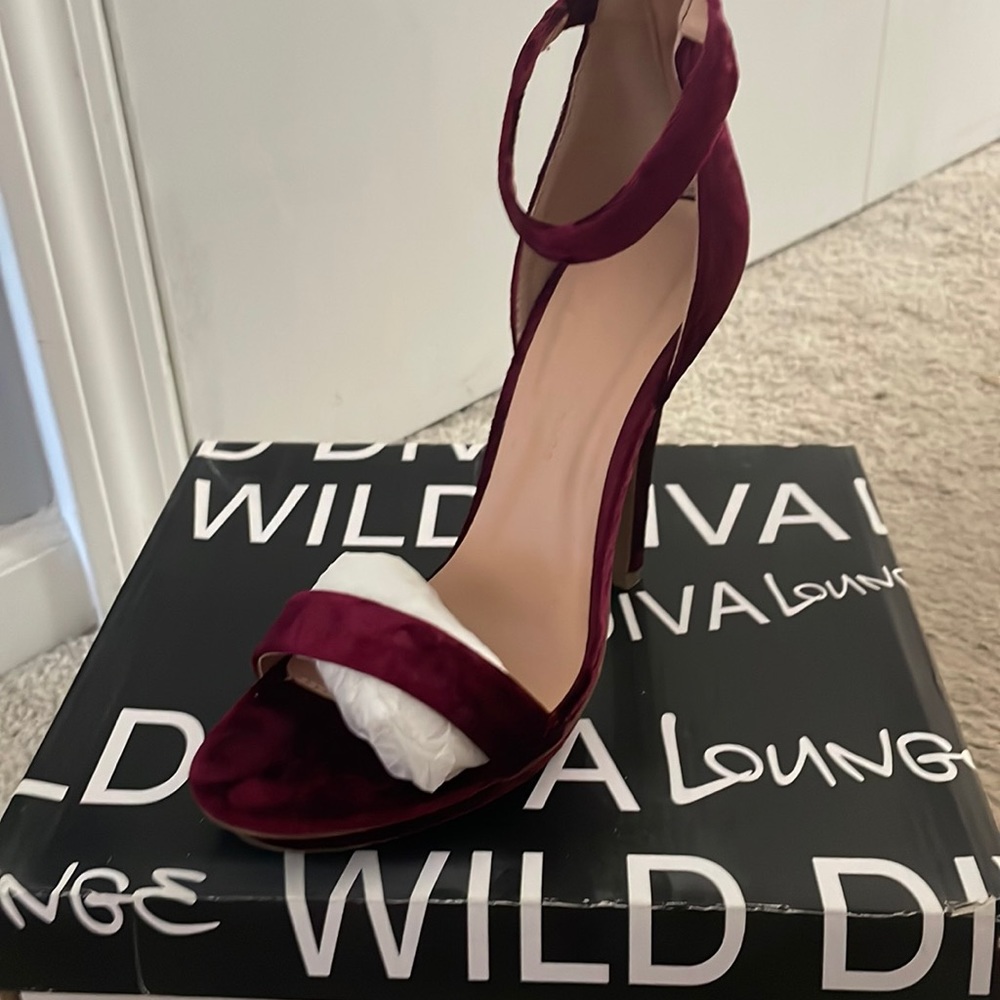 Maroon suede strappy high heels. Only worn once. No longer fit.